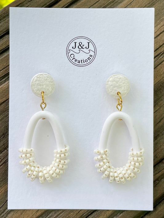 White beaded with Gold Tone